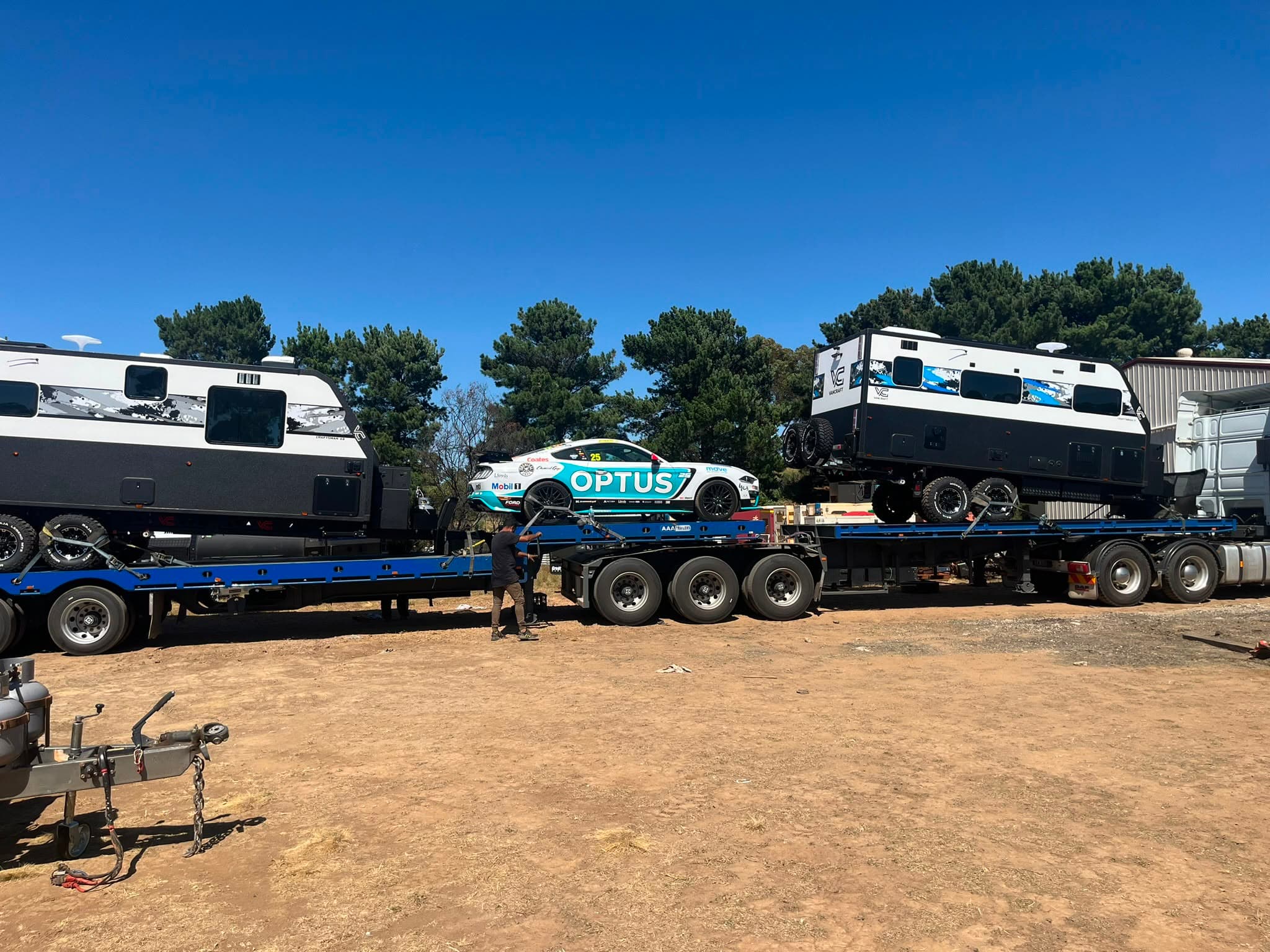 Two caravans loaded on GNDJ trailers